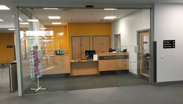 A set of glass doors in an office.