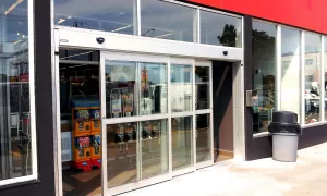 A set of bypass doors to a store.