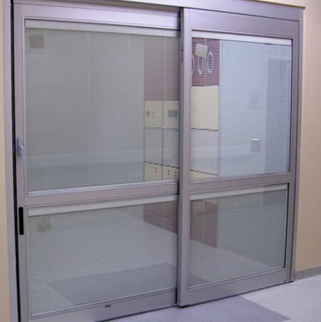 7000_2_0.jpeg A set of doors in a hospital room.