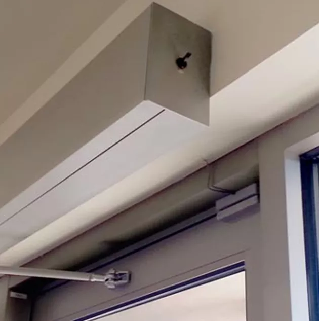 Magic-access-product.jpeg A door with a swinging door opener at the top.