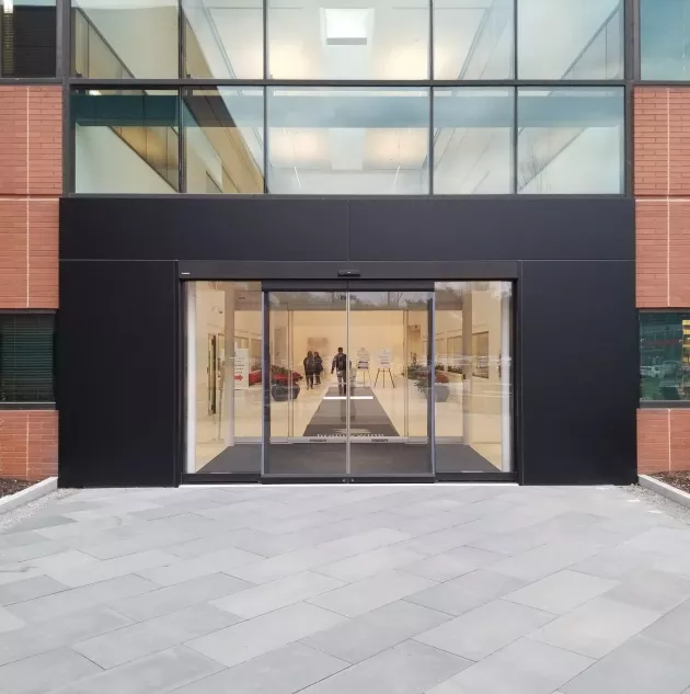 A set of sliding doors at the entrance to a building.