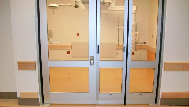 hybrid swing/fold automatic door in healthcare setting